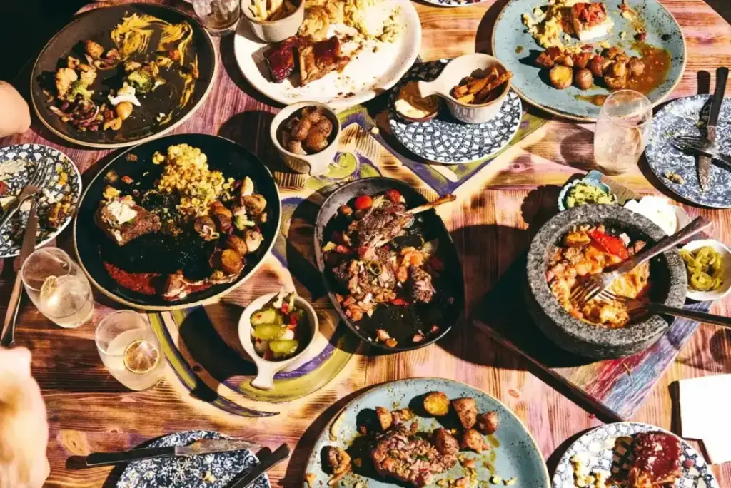 A feast of Latin American dishes spread across the table